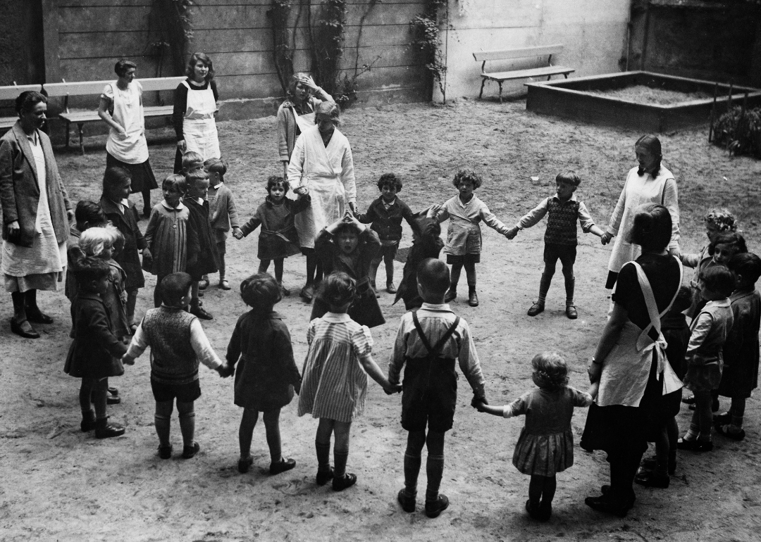 Children playing game in a schoolyard.