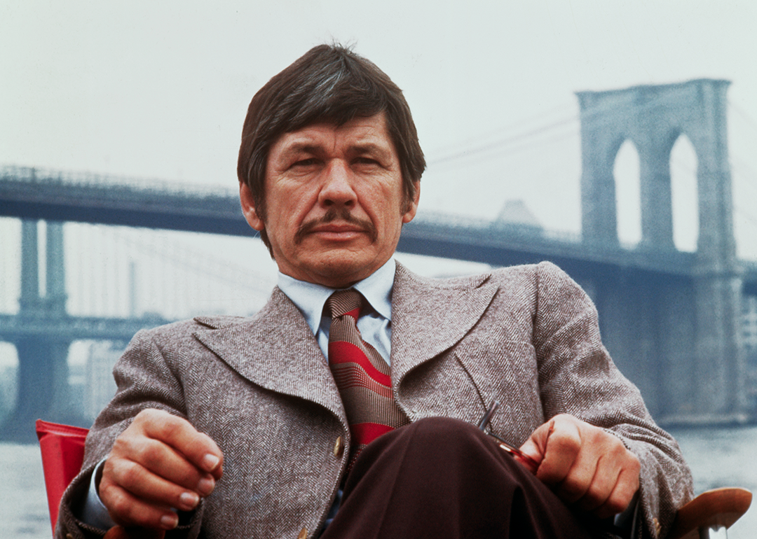 Charles Bronson seated on the banks of the East River in ‘Death Wish’.