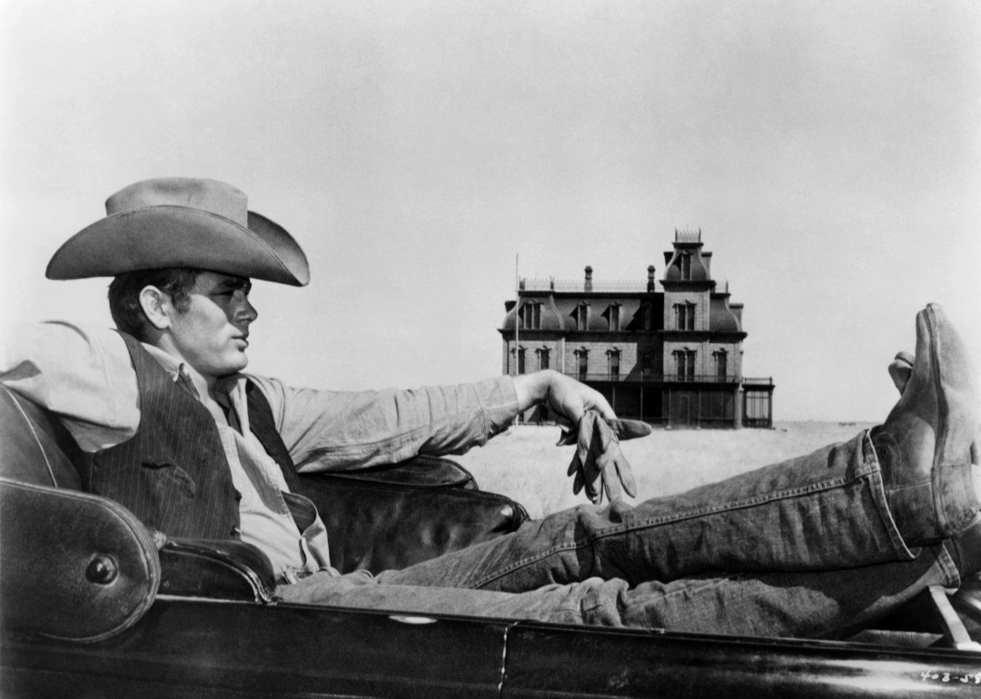 Iconic shot of James Dean in a car in front of a farmhouse in "Giant."