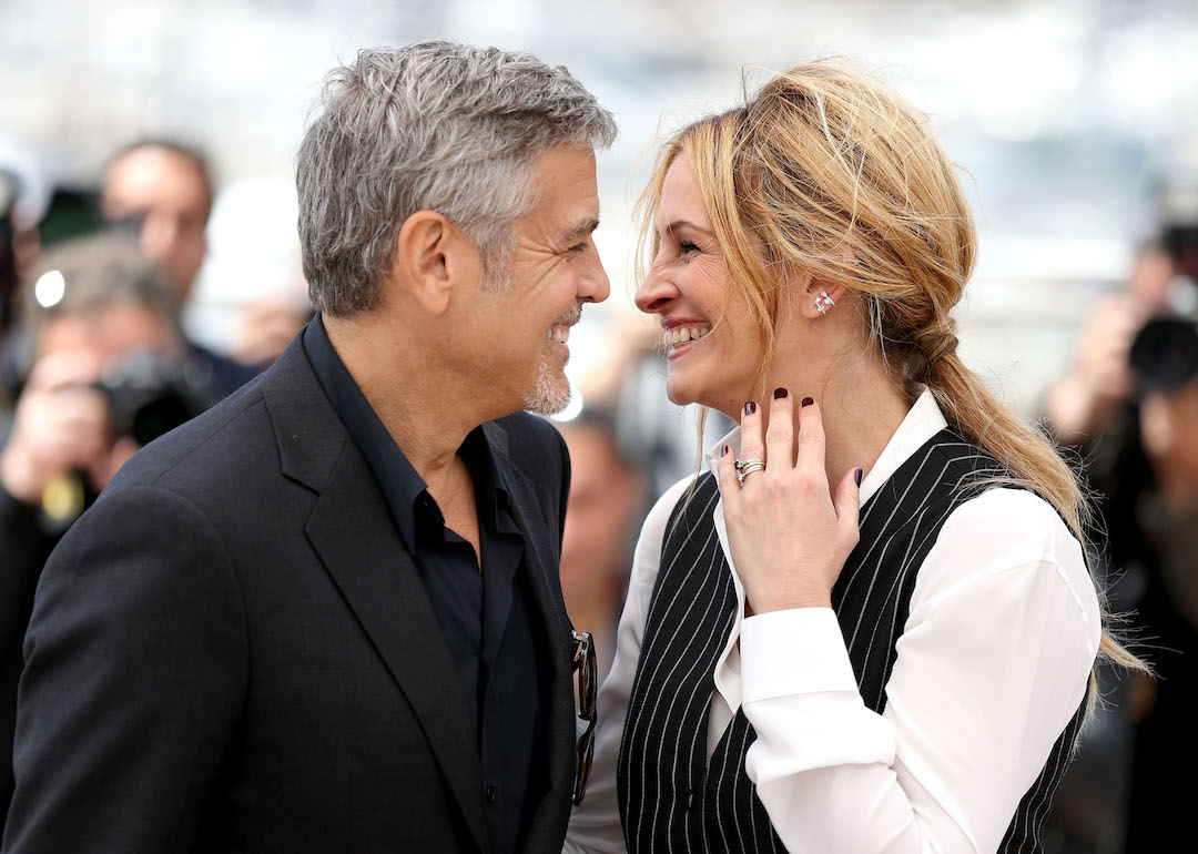 George Clooney and Julia Roberts smile at each other during the Cannes Film Festival in 2016.
