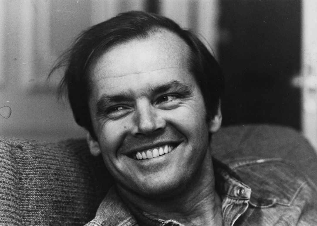 Actor Jack Nicholson smiling at the camera in the 1970s.