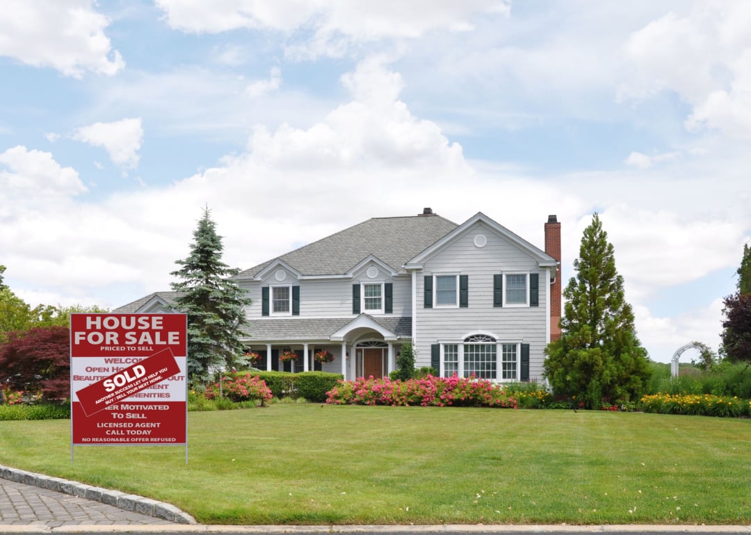 Home with sold sign.