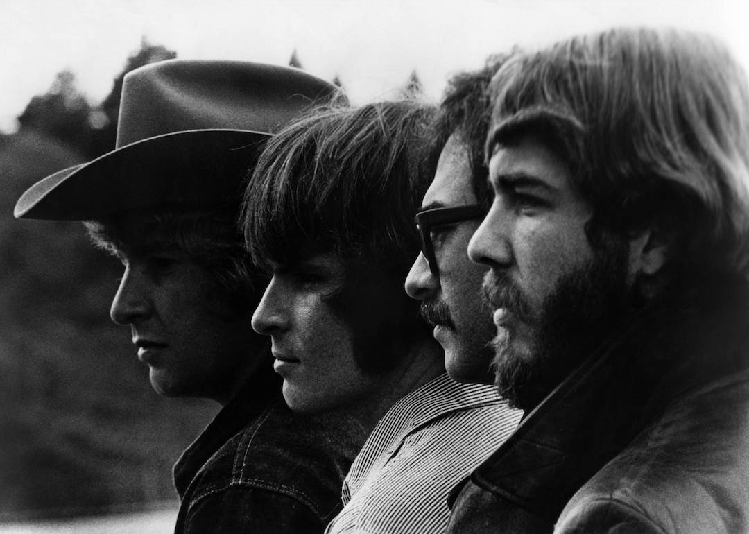 Profiles of Tom Fogerty, John Fogerty, Stu Cook, and Doug Clifford of Creedence Clearwater Revival.