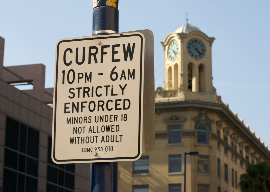 Street curfew sign.