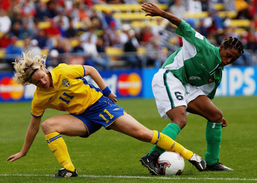 Players from Sweden and Nigeria compete in the world cup.