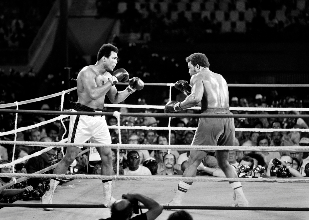 Muhammad Ali and George Foreman fight on October 30, 1974 in Kinshasa, Zaire during their world heavyweight championship match. 