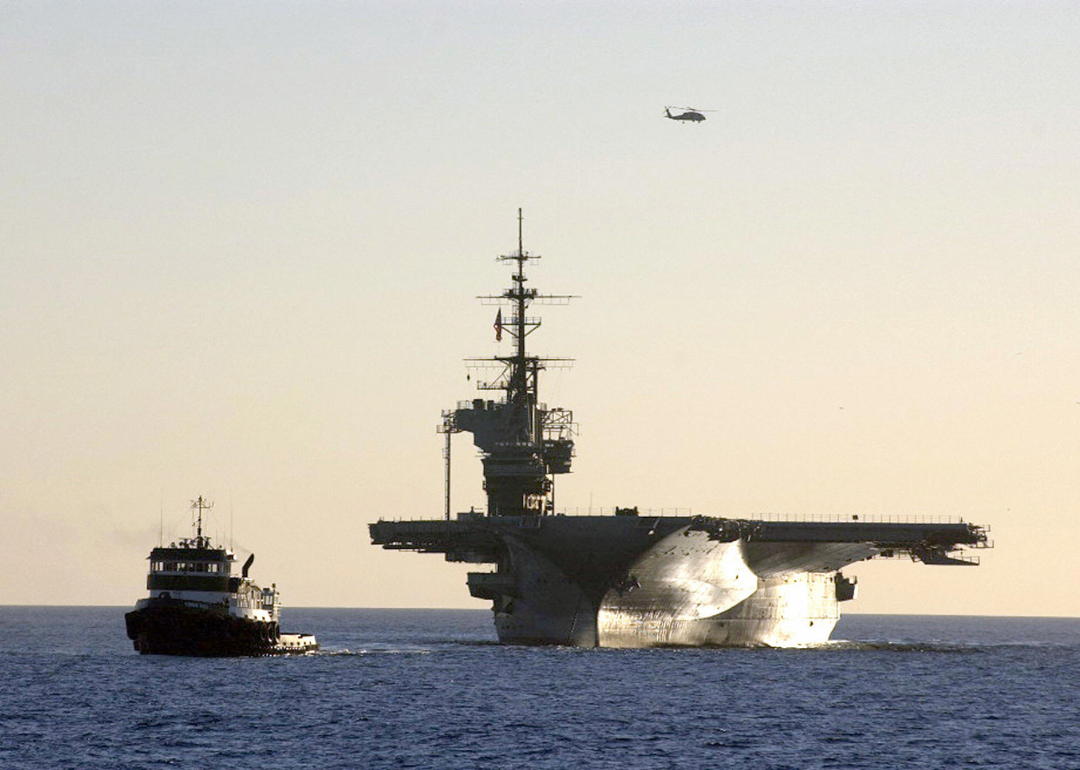 The decommissioned aircraft carrier USS Midway is towed into the San Diego Bay in California, 2004