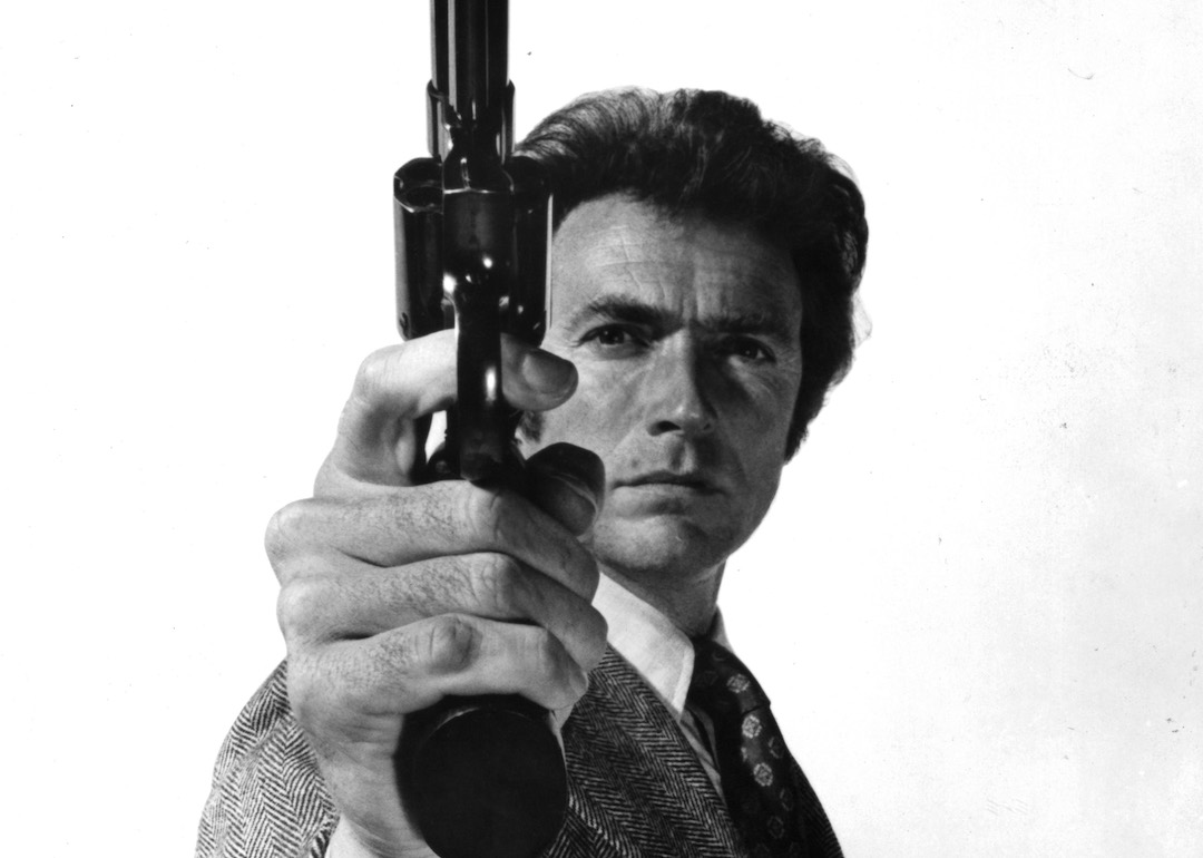 Clint Eastwood holds a gun in publicity portrait for the 1971 film 'Dirty Harry.'