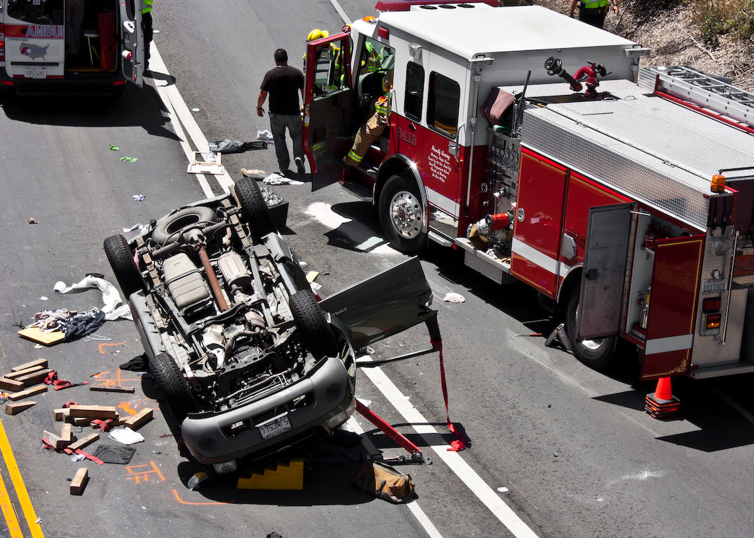The scene of a traffic accident in Monterey, California, involving an overturned SUV.