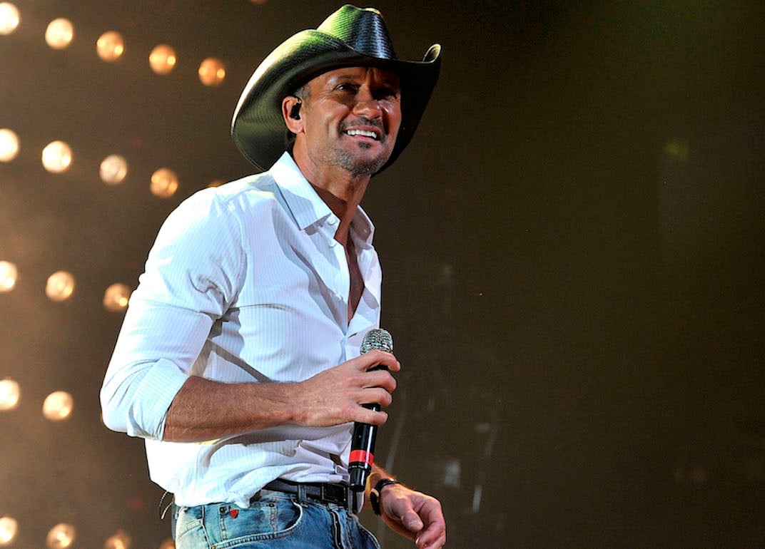 Tim McGraw performs during Keith Urban's Fourth annual We're All For The Hall benefit concert at Bridgestone Arena on April 16, 2013 in Nashville, Tennessee.