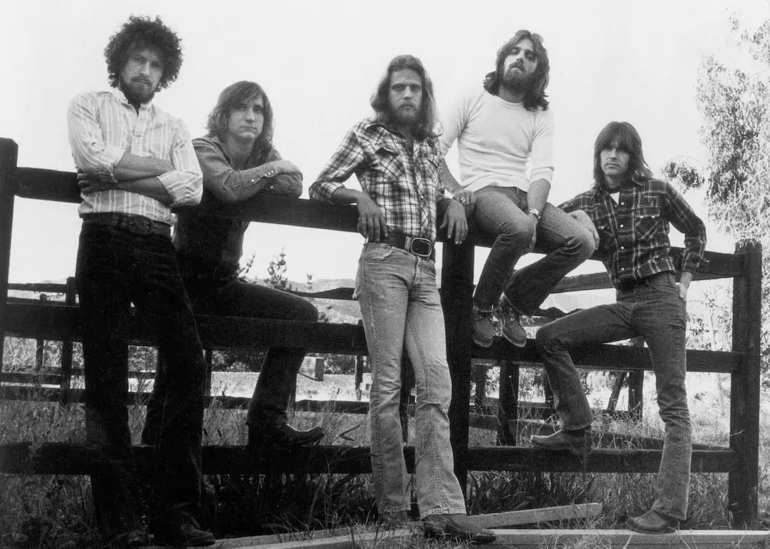 Don Henley, Joe Walsh, Bernie Leadon, Glenn Frey, and Randy Meisner of the rock band The Eagles pose for a portrait in circa 1976.