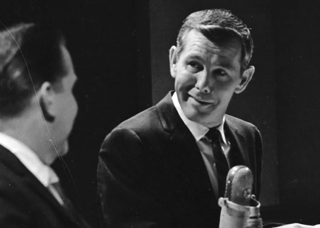 Johnny Carson, hosting NBC's 'Tonight' show, in December 1964.