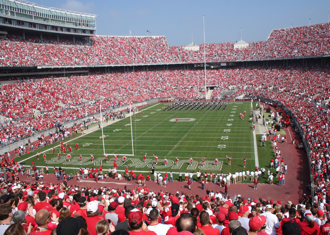 Ohio Stadium at Ohio State University, popularly known as "the horseshoe" filled with a cheering audience in red