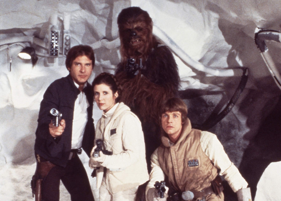 Actor Harrison Ford ,Carrie Fisher, Harrison Ford, Mark Hamill and Peter Mayhew as Chewbacca pose for a portrait on the set of 'Star Wars: The Empire Strikes Back' in 1979