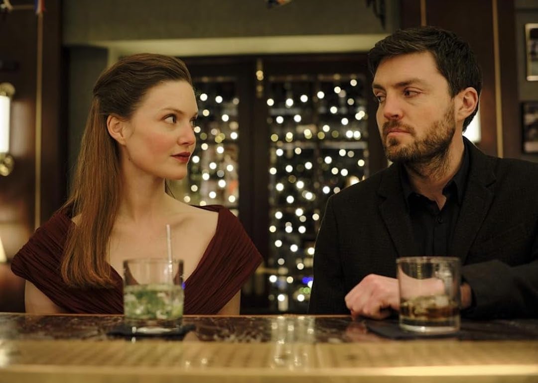 Actors Holliday Grainger and Tom Burke in 'C.B. Strike.'