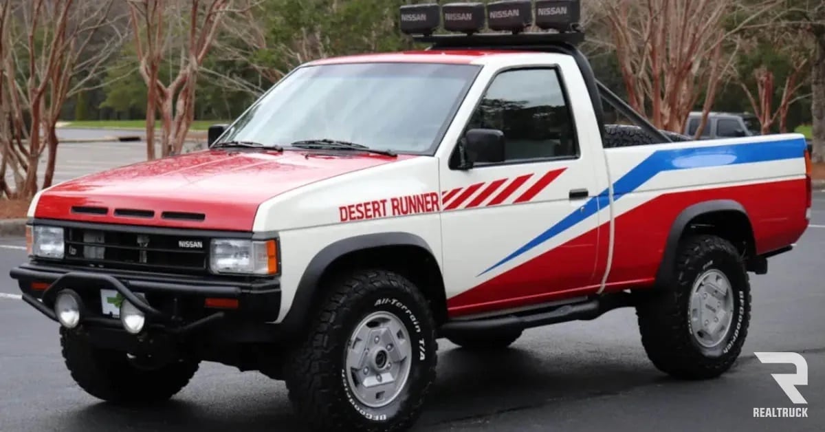 A white, blue, red Nissan Desert Runner.