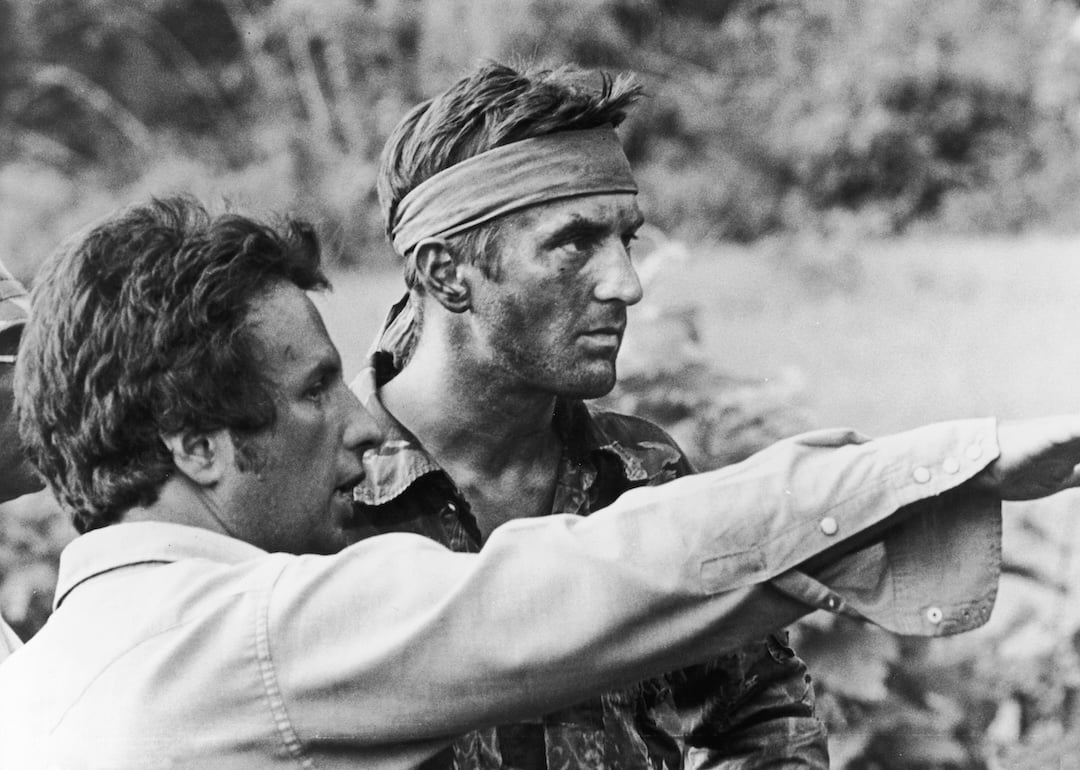 Director Michael Cimino confers with Robert De Niro on the set of "The Deer Hunter" in 1978.
