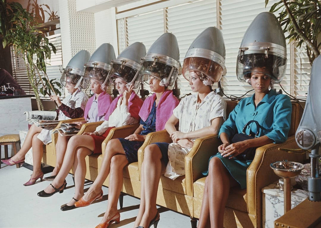 A group of women in a hair salon in Brazil, circa 1960.