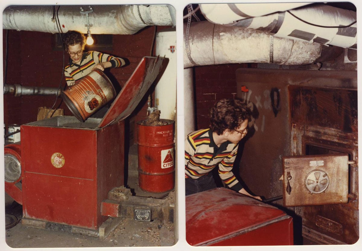 Kid in a striped 70s shirt loading a coal furnace in the basment