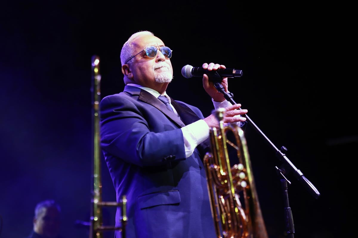 Willie Colón performing during the Idilio Sinfónico concert with Orquesta Filarmonica de Puerto Rico in 2025