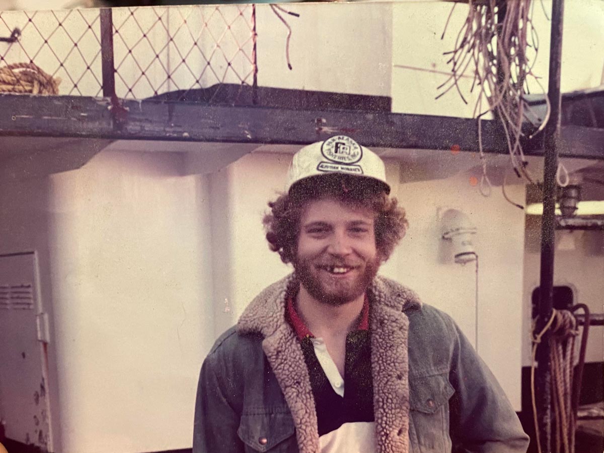 A young man smiling