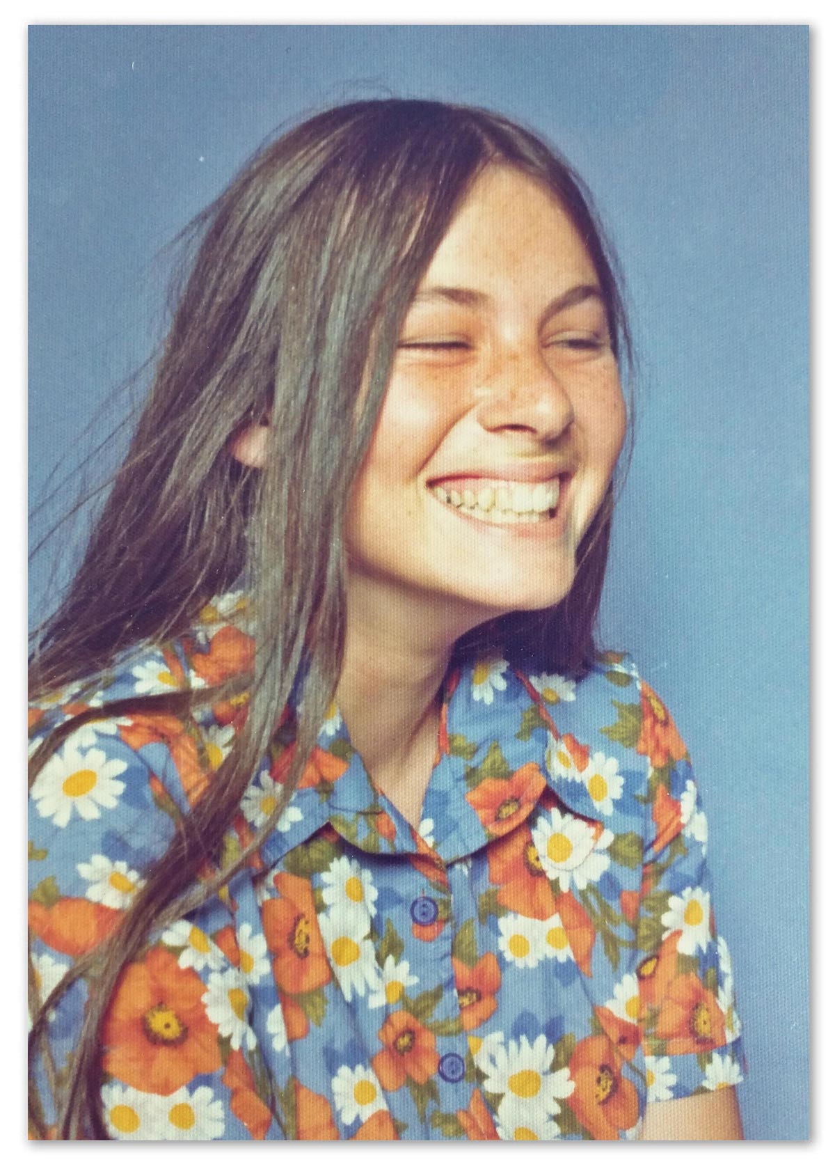 Woman laughing very hard in a school photo