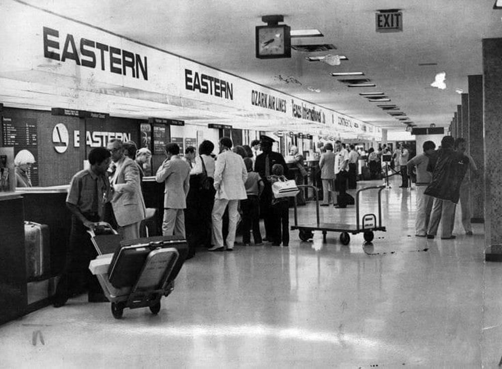 Black and white photo of the check-in counters at the San Antonio Airport
