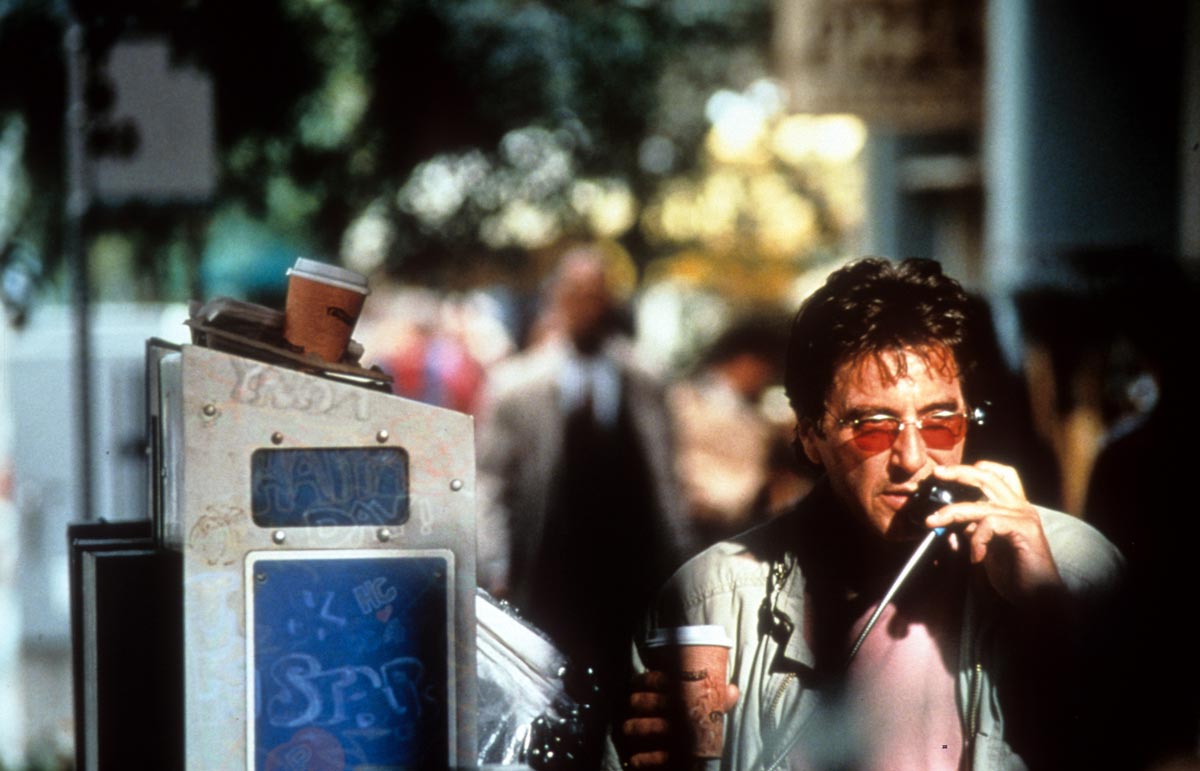 Al Pacino talks on a payphone in a scene from the film 'The Insider', 1999.