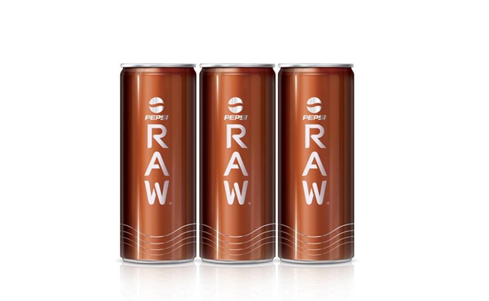 Three cans of Pepsi Raw