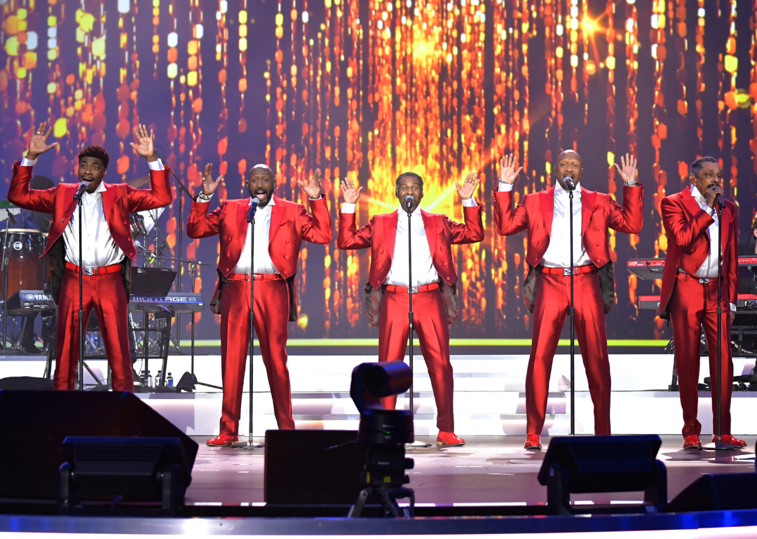 Jawan M. Jackson, Otis Williams, Terry Weeks, Tony Grant, and Ron Tyson performing in 2023.