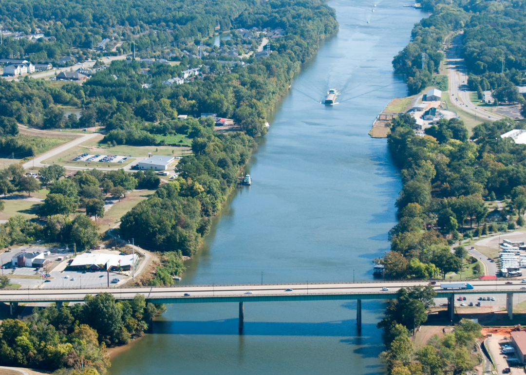 An aerial view of a waterway going through Tuscaloosa.