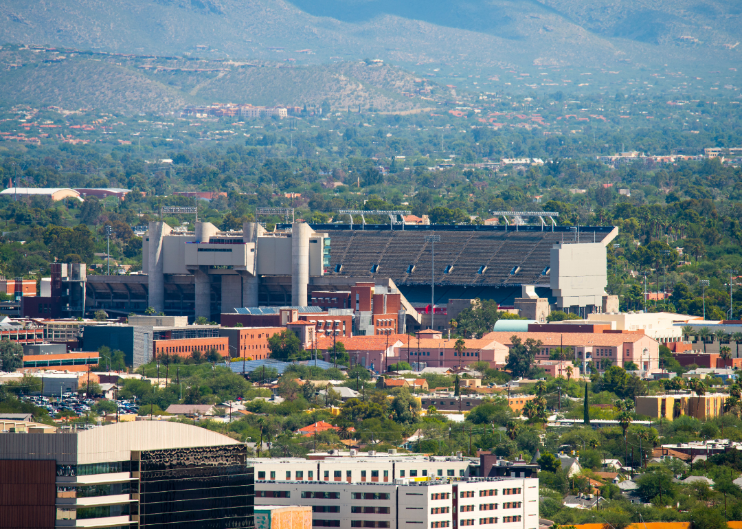 An aerial view of Tuscon with the Arizona University stadium in the background.