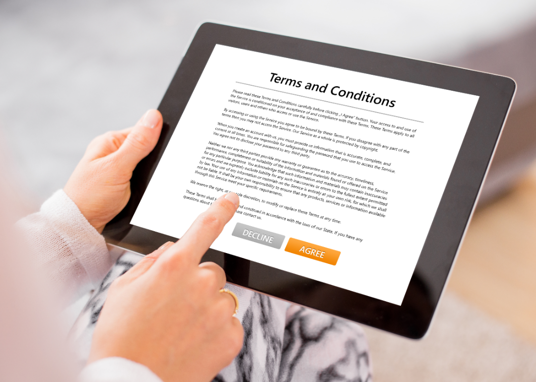 A Terms and Conditions form appears on a tablet screen.
