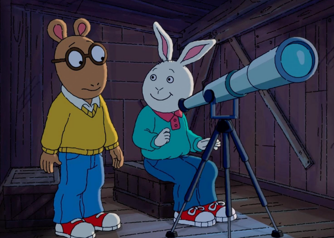 A still of Arthur next to Buster Baxter sitting in front of a telescope.