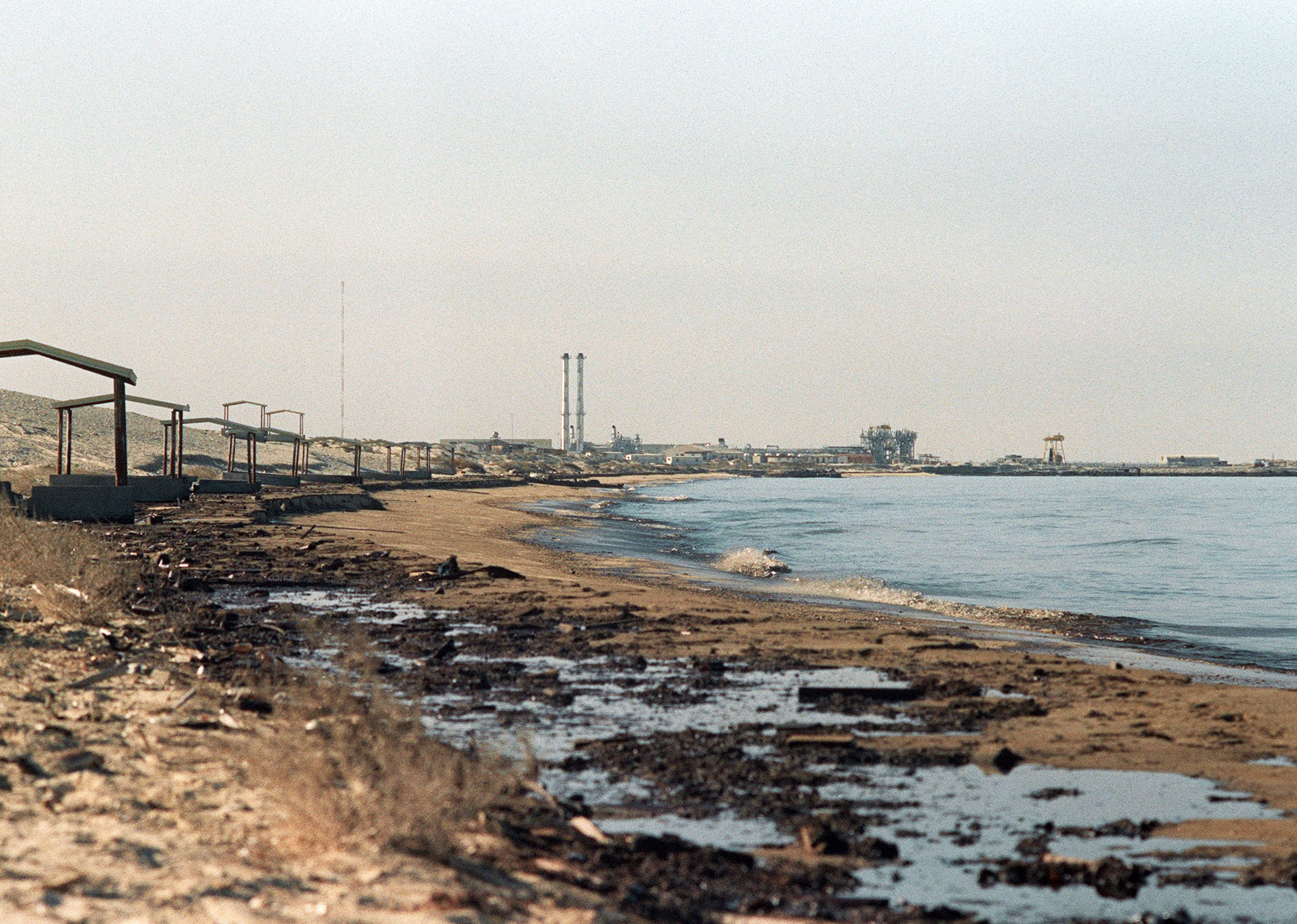 Oil washes up on a Persian Gulf beach near the Kuwait-Saudi border.