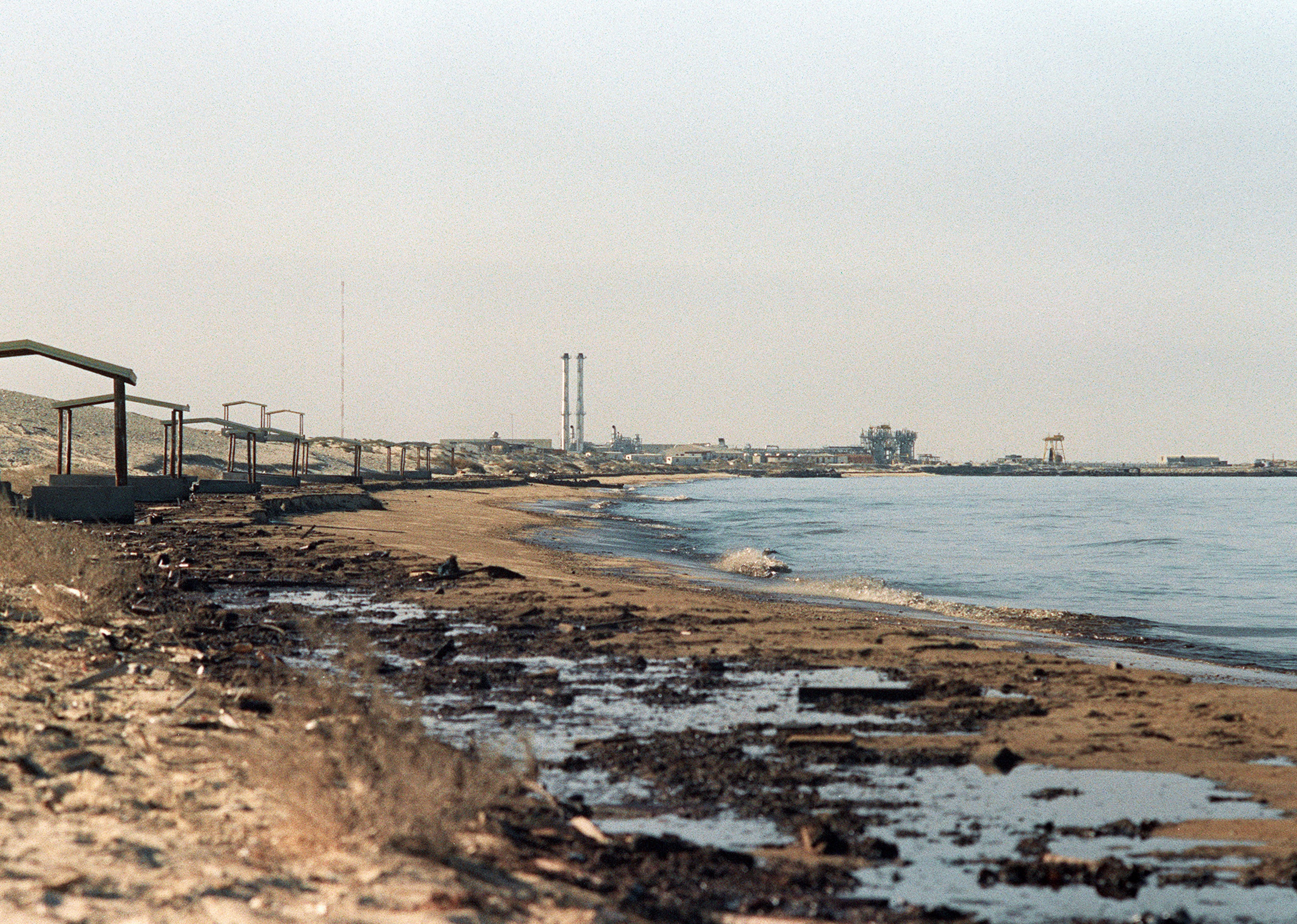 Oil washes up on a Persian Gulf beach near the Kuwait-Saudi border.