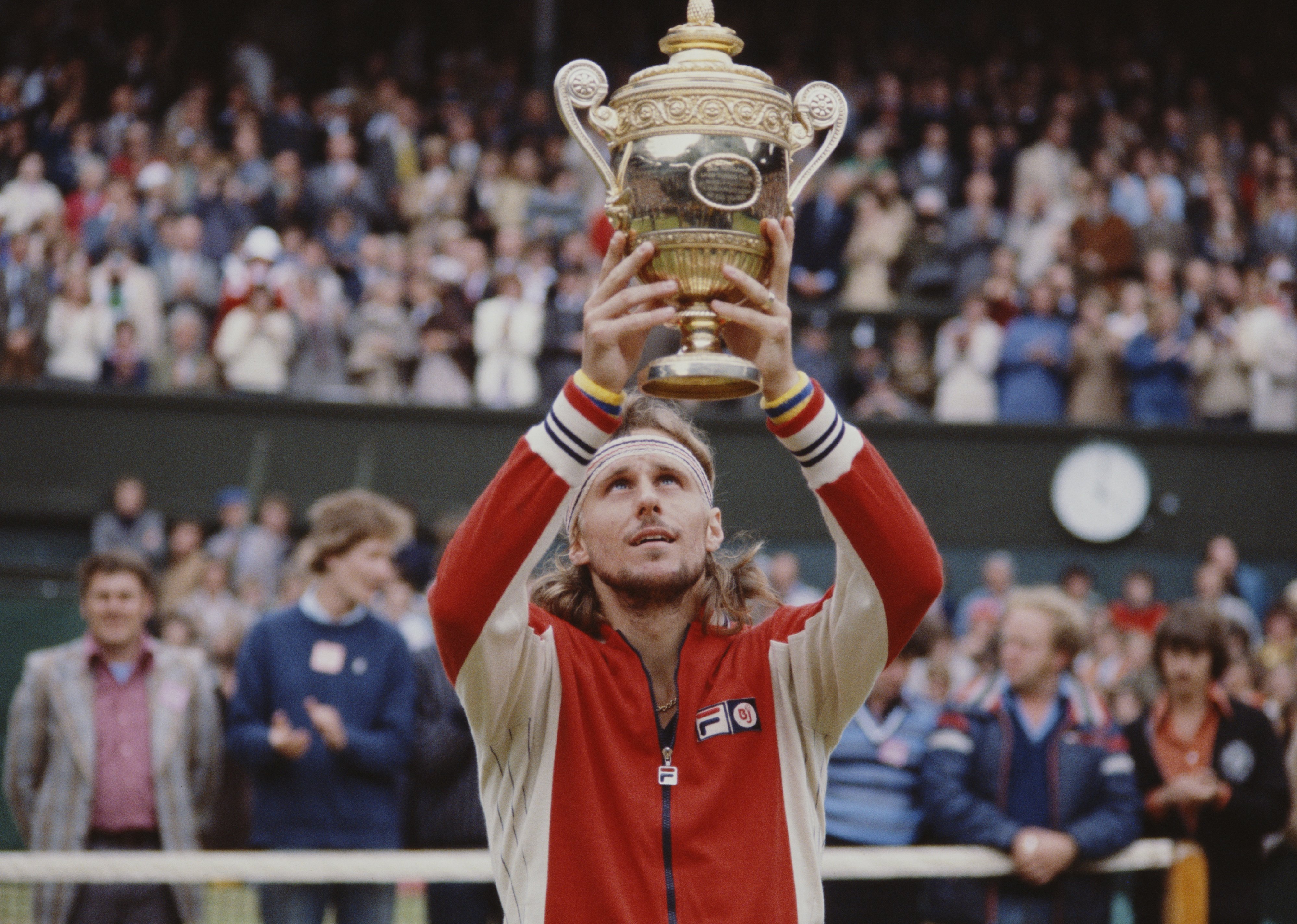 Björn Borg holds the trophy aloft after winning the 1978 Wimbledon Lawn Tennis Championship.