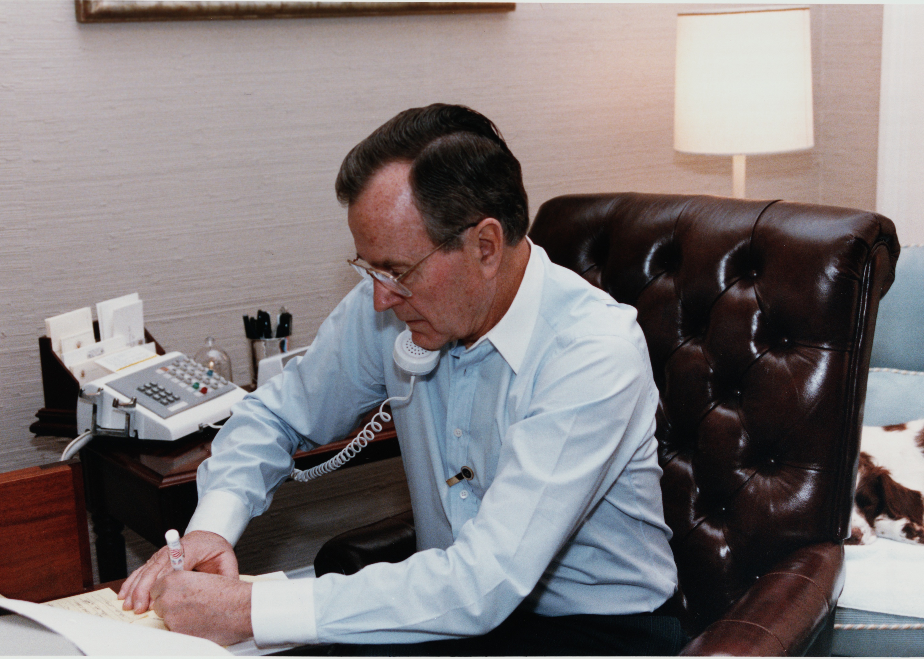 President Bush on the phone with James Baker after the Secretary