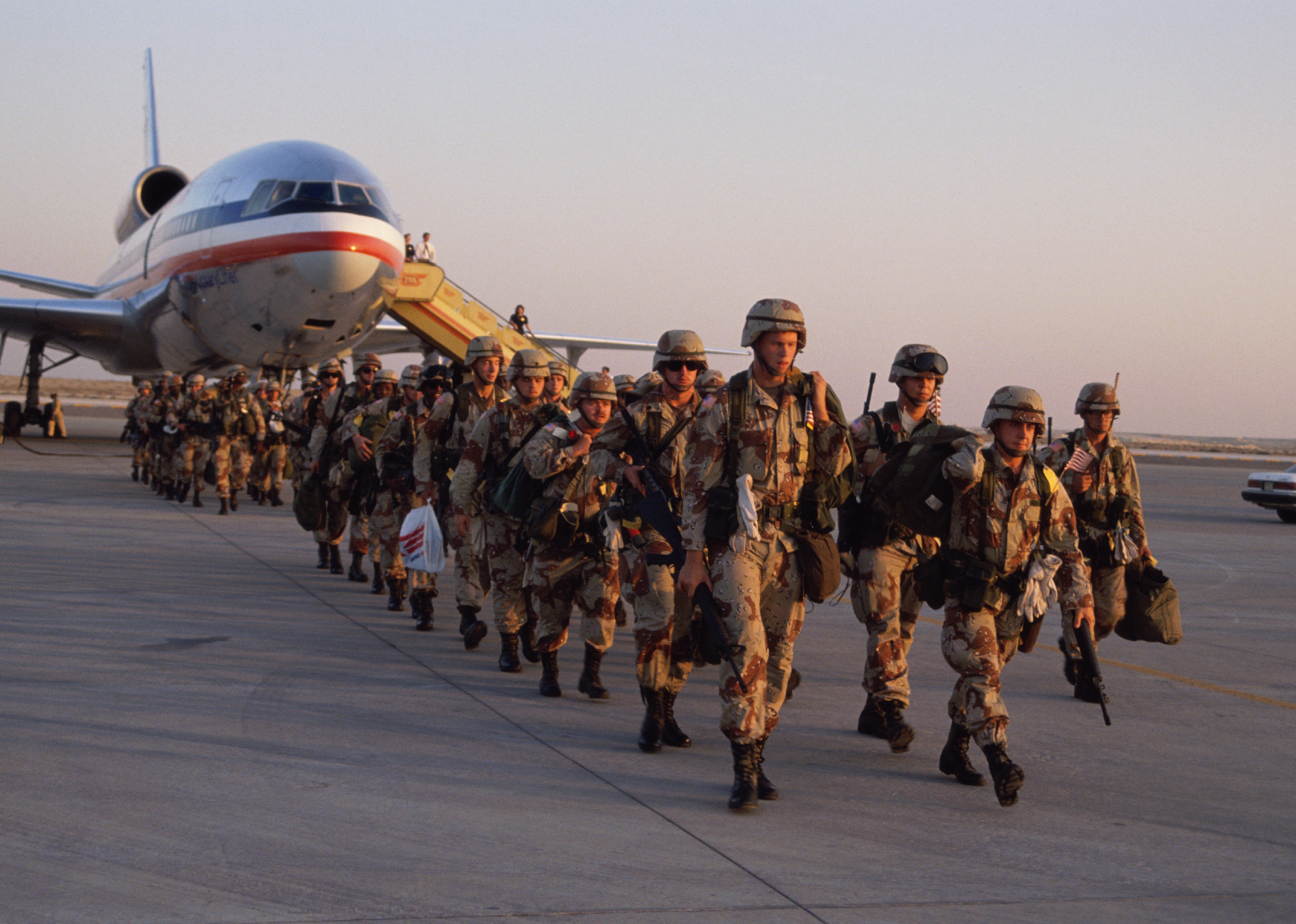 U.S. troops arrive in Saudi Arabia to take part in Operation Desert Shield.