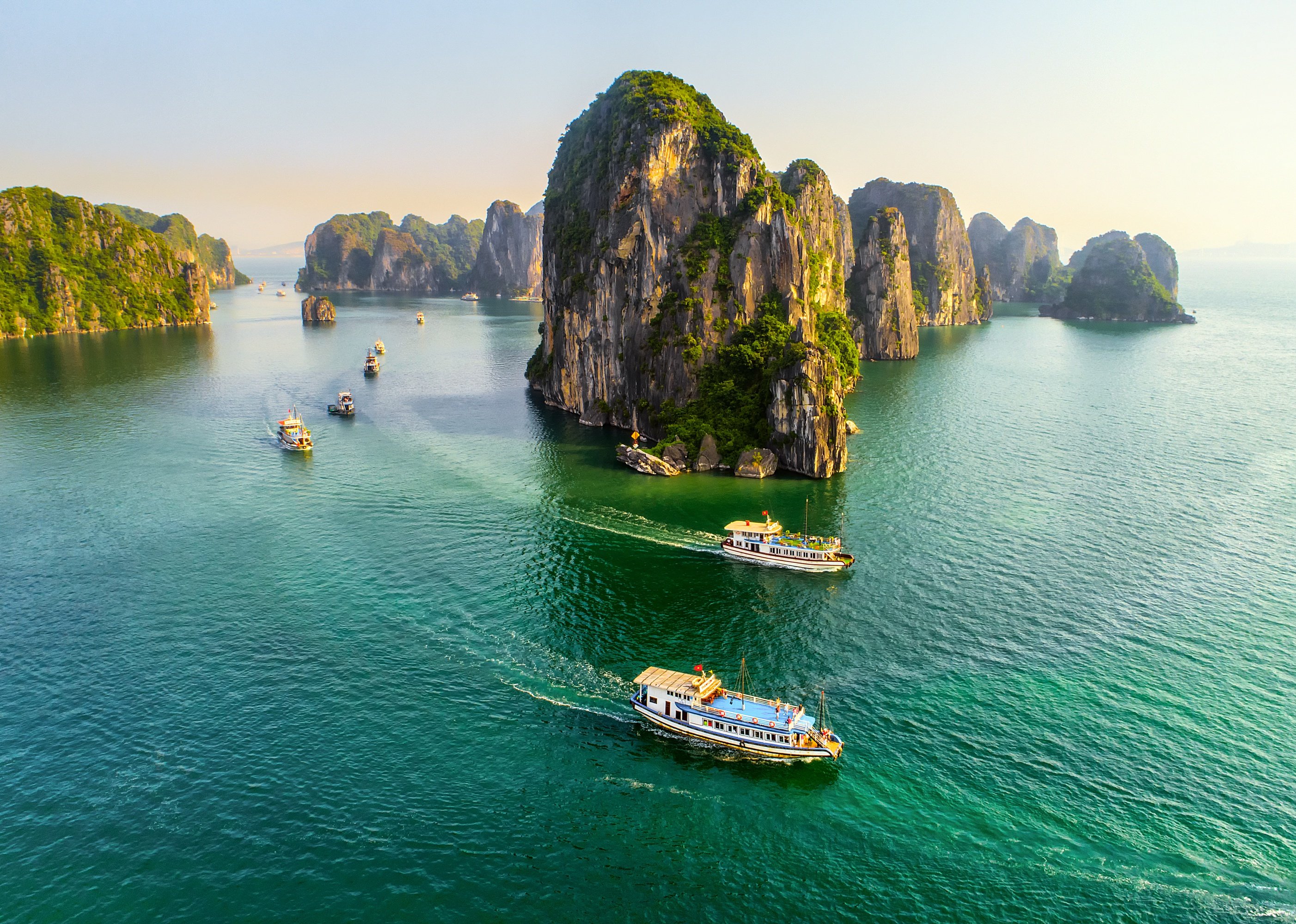 Aerial view floating fishing village and rock island, Halong Bay, Vietnam.