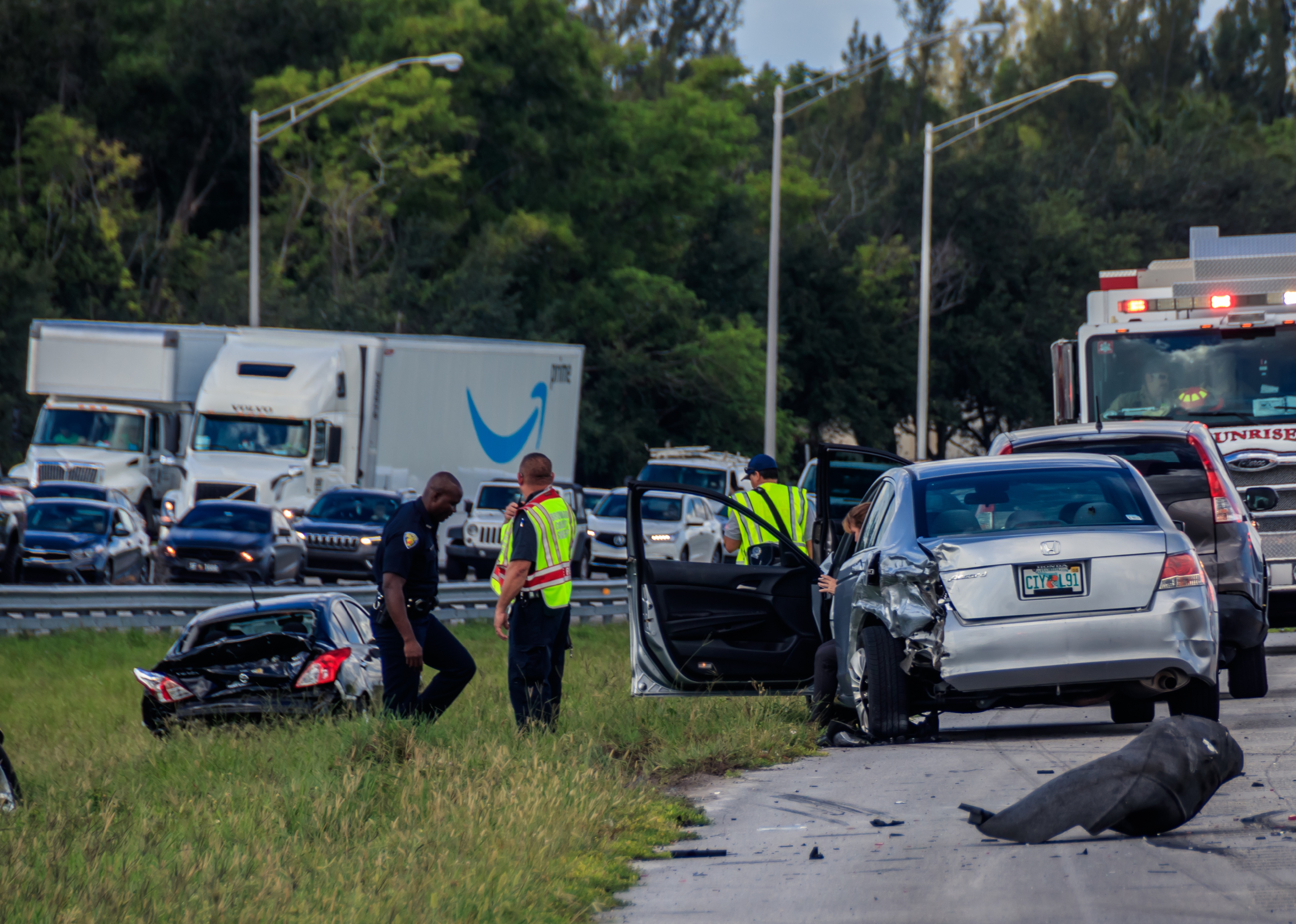 Car accident scene along highway.