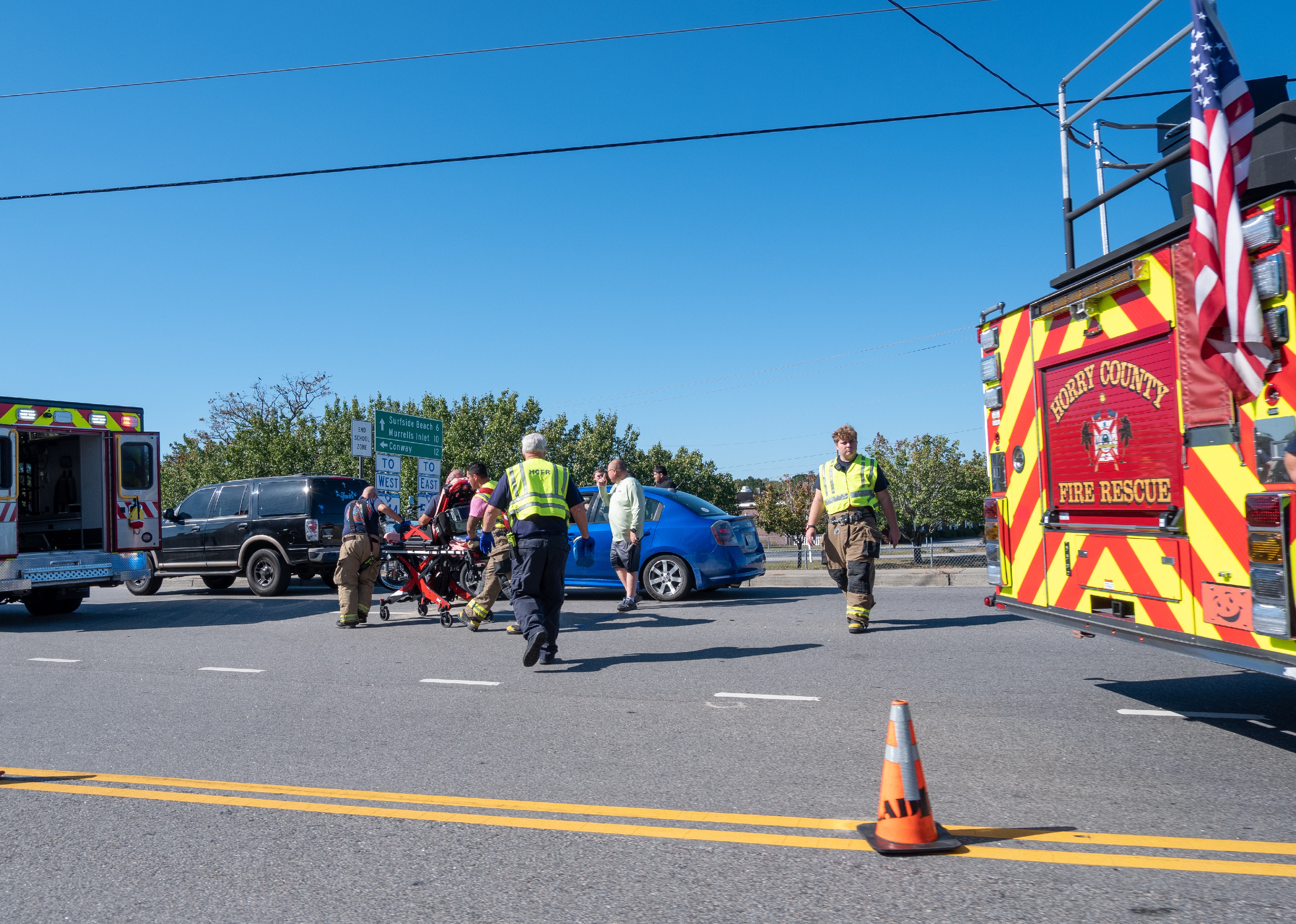 First responders on the scene of a vehicle accident.