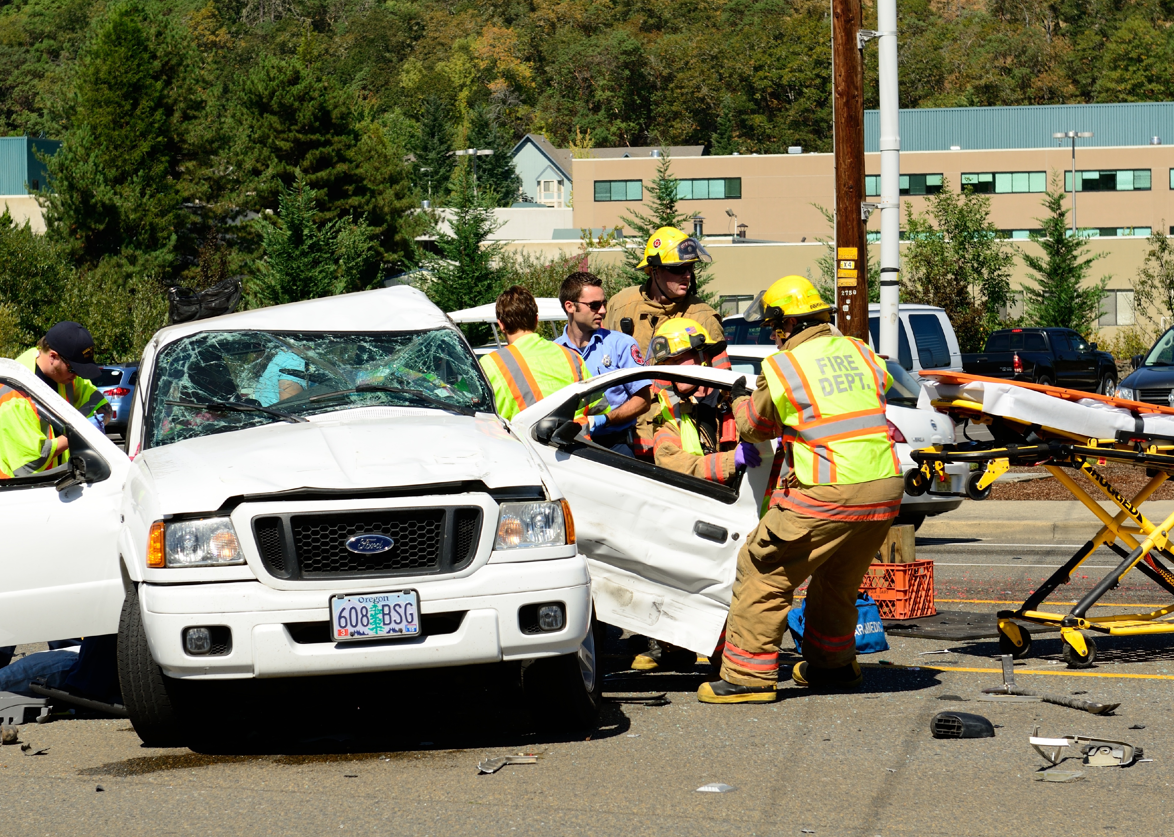 Firefighters extricate victims of a two vehicle t-bone accident.
