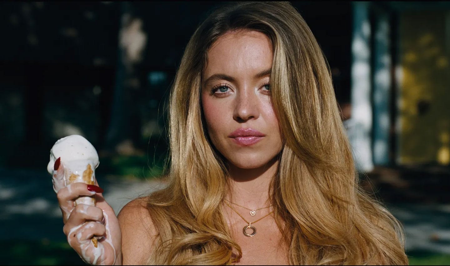 Sydney Sweeney holding an ice cream cone
