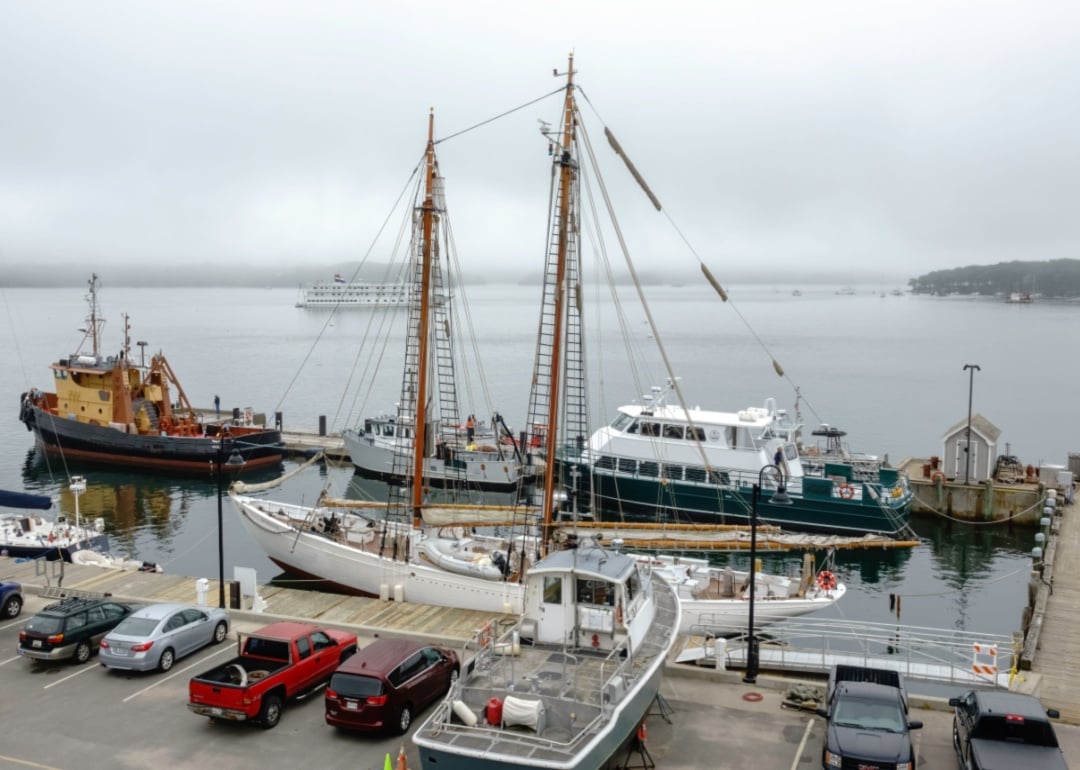 Waterfront scene with portside view of Arctic Schooner Bowdoin, a tall ship at Maine Maritime Academy.
