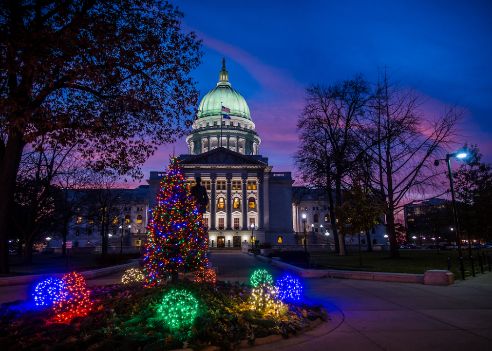 The Capitol building decorated with Christmas lights.