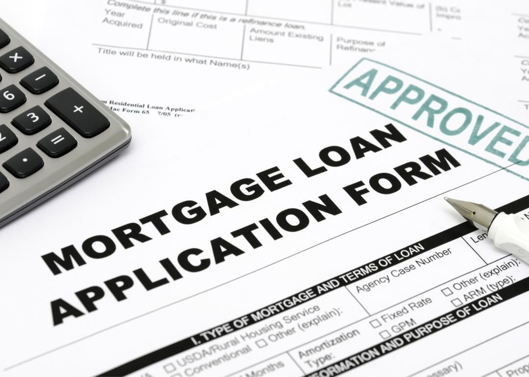 Calculator and approved mortgage loan application form