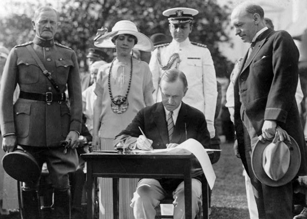 Calvin Coolidge signing the Veterans