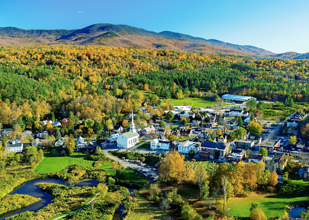 An aerial view of fall colors in the village of Stowe.