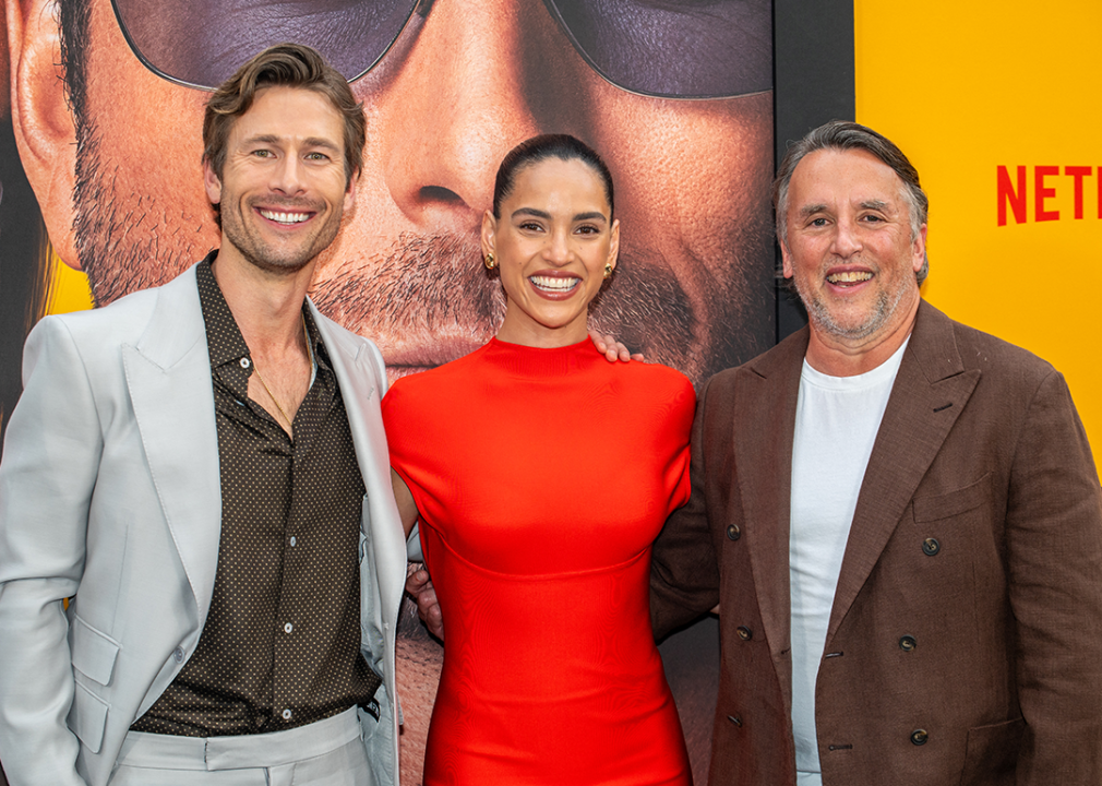 Glen Powell, Adria Arjona, and Richard Linklater attend a screening of ‘Hit Man’.